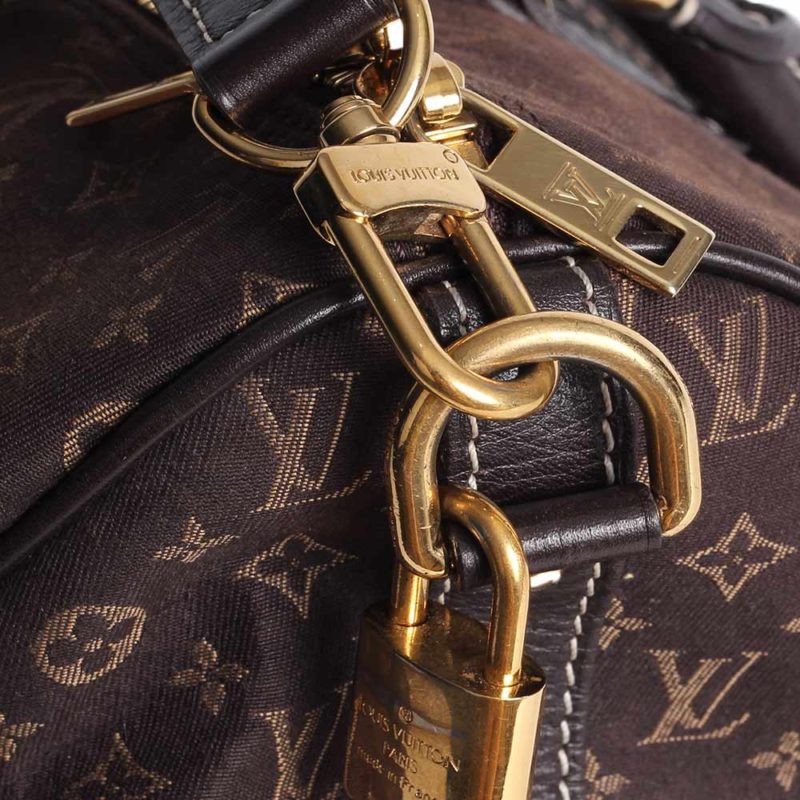 louis-vuitton-monogram-mini-lin-speedy-bandouliere-30-buckle-close