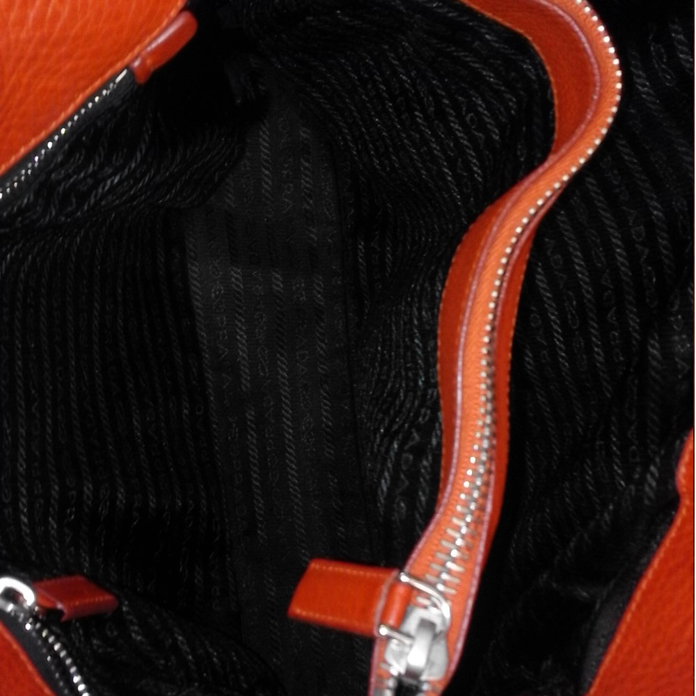 PRADA Pebbled Leather Side Pockets Shoulder Bag Orange | Luxity