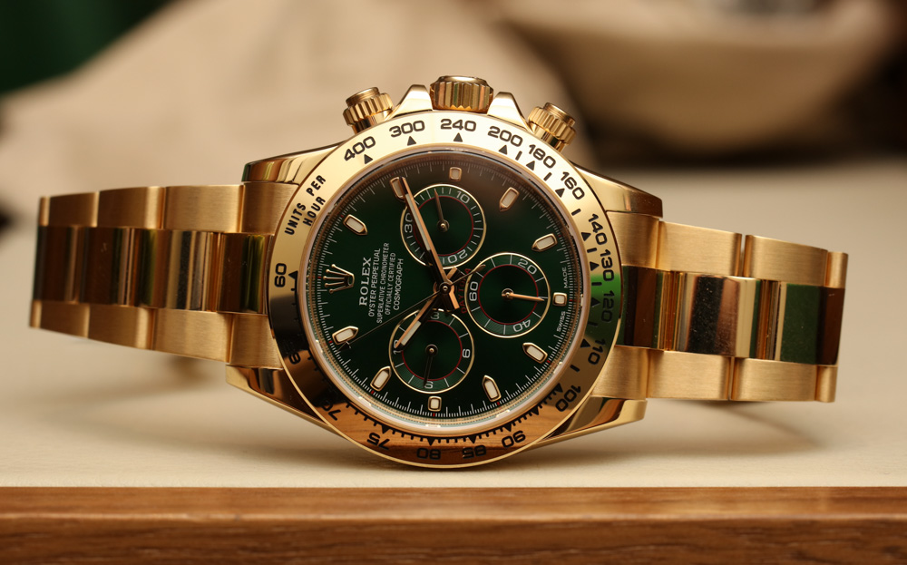 Gold and green watch